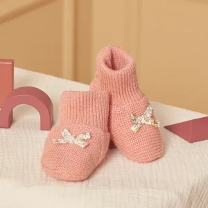 Chaussons de naissance rose poudré