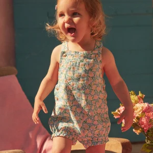 Salopette courte écrue et bleue à imprimé fleuri